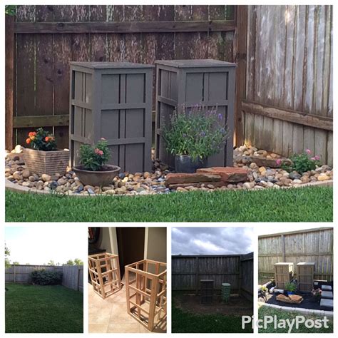 little metal boxes in my neighbors yars|utility box in my yard.